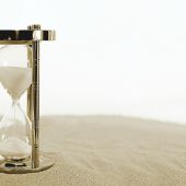 Cursus time management - zandloper in het zand